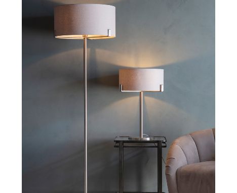 { Option of lots:  34 } Evelyn Floor Lamp  This modern floor lamp has a chic nickel coloured stand with a soft wheat hued sha