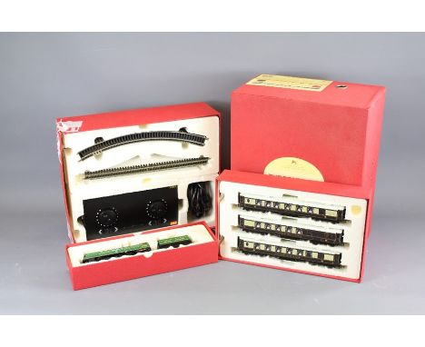 A Hornby 00 Gauge Premier Model Railway Boxed Set. This lot includes additional track both straight and curved, extension pac