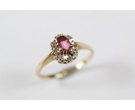 A 9ct Gold Diamond and Ruby Ring, size H, approx 1.44 gms, set with a 5 x 3 mm ruby and approx 6pts of 8-cut dias.