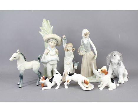 A Collection of Porcelain Figurines. The figurines include a Lladro Mexican boy (22 cms), a Nao Girl with a basket and goose 