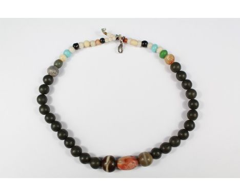 Antiquity - Necklace of Beads. The necklace comprises of beads including agate beads from Mesopotamia, currency beads, a turq