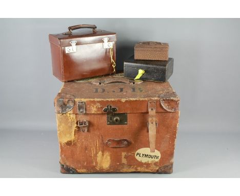 A Vintage Travelling Trunk. The trunk having custom labels together with another leather travelling box and two jewellery box