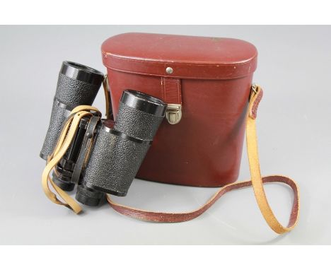 A Pair of Vintage Carl Zeiss Jena 7 x 50 Field Binoculars contained in the original leather case.