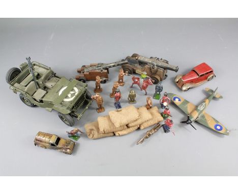 A Quantity of Vintage WWII Related Lead Soldiers and Sandbags. This lot includes a replica U.S.A Jeep, a Spitfire, two desk c