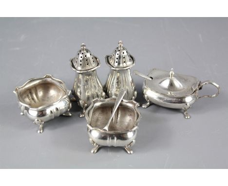 Five Items of Silver. The lot includes two salts, two peppers, a mustard and two spoons, together with a silver plate cut-gla