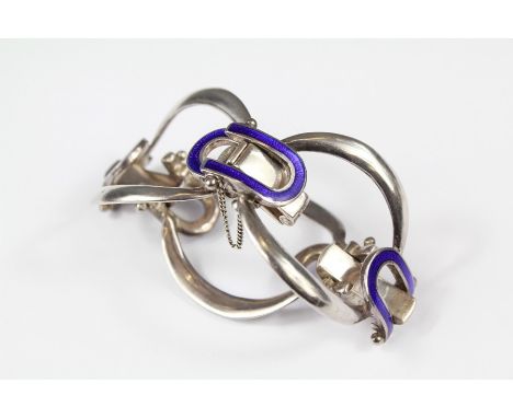 A Scandinavian Silver and Enamel Bracelet. The bracelet having three ecliptic loops bound by blue enamel links, mm A.M Ltd st