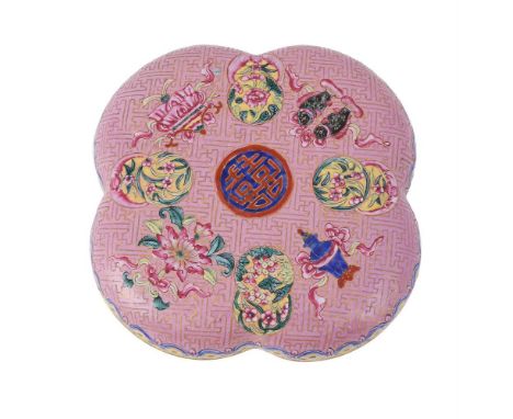 A Chinese lobed canton enamel box and cover, 18th century, painted in bright enamels with bajixiang patterns alternated with 
