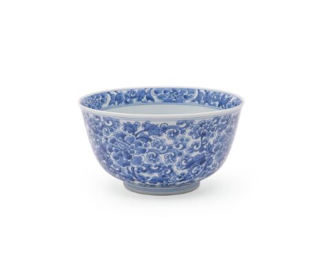 A Chinese blue and white 'Lotus' bowl, Kangxi, painted in bright tones of blue in the centre of the interior with a lotus spr