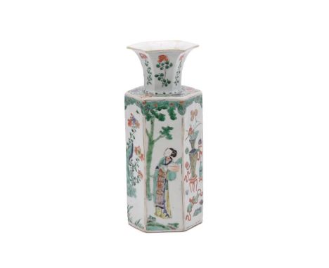 A Chinese Famille Verte hexagonal vase, Kangxi, decorated with alternating panels of figures, antiques, and flowers, with pur