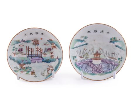 A pair of Chinese famille rose 'Scenes of Jiangxi' saucers, mark of Daoguang and of the period (1821-1850), painted with pavi