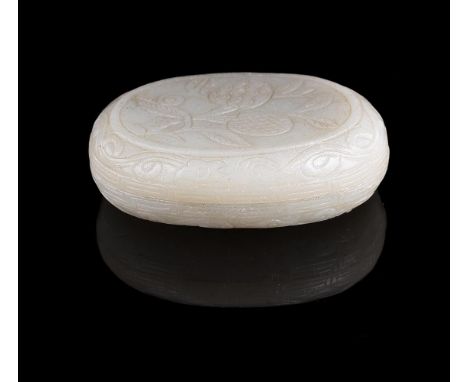 A Chinese pale celadon jade 'lychee' oval box and cover, Ming Dynasty, 17th century, the cover carved with two fruit and foli