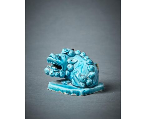 A Chinese turquoise glazed model of a Buddhist Lion joss stick holder, Kangxi, Rothschild label no. 12 and with additional in