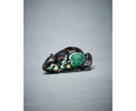 A Chinese small biscuit glazed 'tree shrew' water dropper, Qing Dynasty, probably Kangxi, Rothschild label no. 438, 8.5cm lon