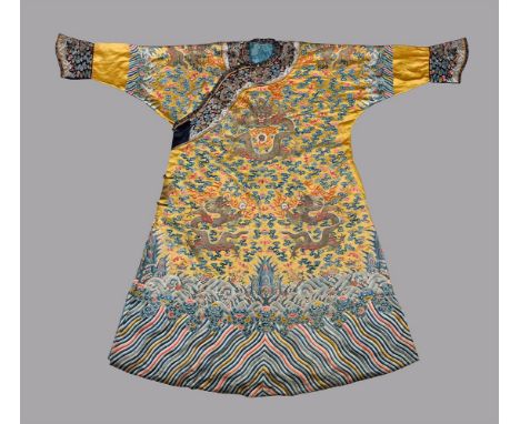 A rare Chinese Imperial golden-yellow 'Dragon' robe made for a consort to the Emperor, Jifu, Qing Dynasty, early 19th century
