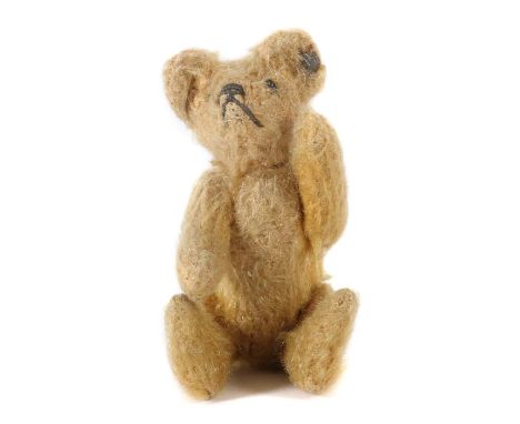    Steiff Teddybär   wohl 5307, 1909-1933, Gliederkörper, Stcknadelaugen, Knopf, H: 10 cm. Altersspuren, 1 Auge fehlt.       