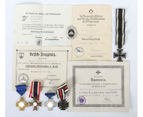    Konvolut Orden und Urkunden   3. Reich, 1 x EK 2. Kl., 1914, am Band mit Urkunde; 1 x Ehrenkreuz für Frontkämpfer 1914-191