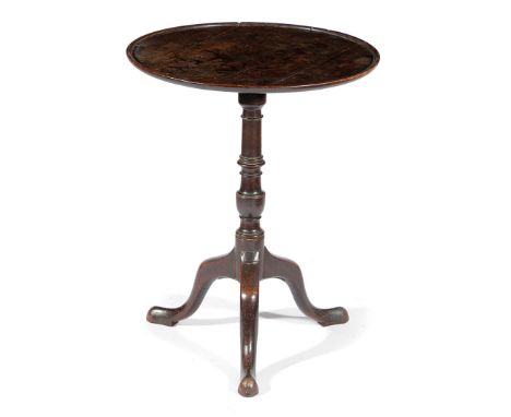 AN EARLY GEORGE III MAHOGANY TRIPOD TABLE C.1760 with a dished circular tilt-top 69cm high, 55.5cm diameter Provenance From t