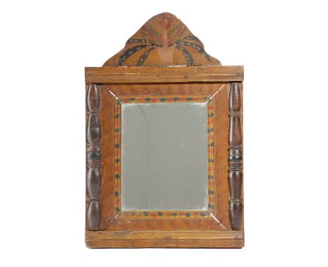 A FOLK ART PAINTED PINE WALL MIRROR POSSIBLY AMERICAN, LATE 19TH CENTURY the rectangular plate within a comb decorated frame,