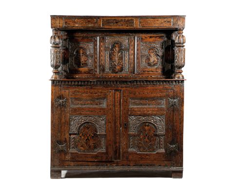 AN OAK AND MARQUETRY COURT CUPBOARD PROBABLY YORKSHIRE, MID-17TH CENTURY inlaid with various woods, with scrolls, leaves, flo