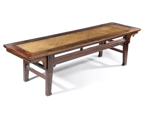 A CHINESE ELM BENCH LATE 18TH / EARLY 19TH CENTURY the rectangular top inset with a rattan panel, with a pierced frieze and s