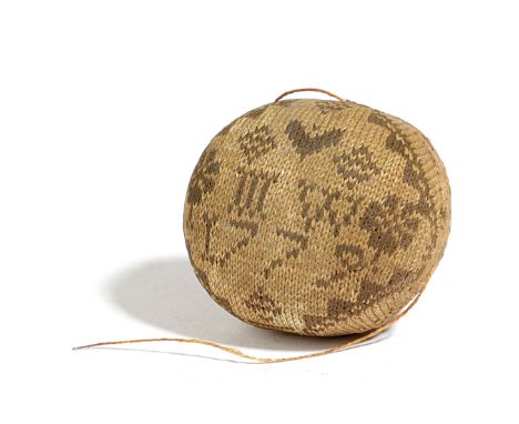 A GEORGE III NEEDLEWORK SAMPLER PIN BALL DATED '1779' worked with flowers and geometric designs in Quaker style, with initial