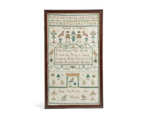A SMALL GEORGE III NEEDLEWORK SAMPLER BY ANN JACKSON worked with coloured silks on a linen ground, with an alphabet and numbe