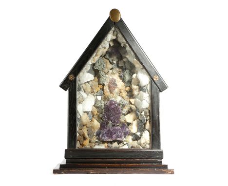 A SPECIMEN MINERAL 'GROTTO' DIORAMA with crystal amethyst and other minerals, in a glazed ebonised case 59cm high, 42cm wide