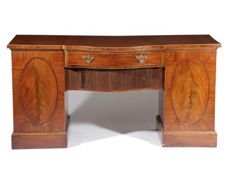 A GEORGE III MAHOGANY SIDEBOARD C.1790 inlaid with ebonised and boxwood stringing, with a frieze drawer above a tambour shutt