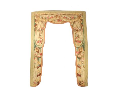 A FRENCH AUBUSSON TAPESTRY PORTIERE 19TH CENTURY worked with tasselled drapes and swags of flowers 269 x 177cm