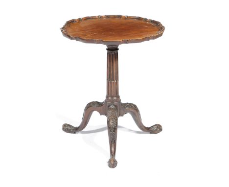 A MAHOGANY TRIPOD TABLE 18TH CENTURY AND LATER the fixed top with a moulded pie crust edge, on a stop fluted stem and cabriol