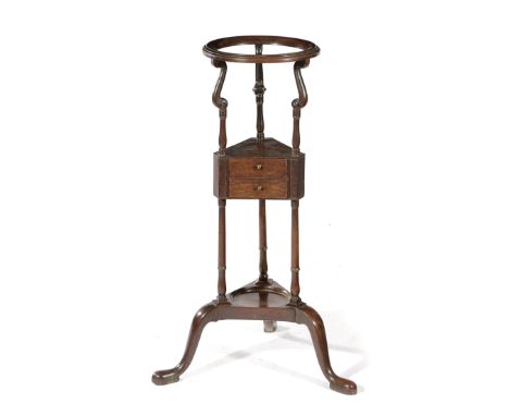 A GEORGE II MAHOGANY WIG OR BASIN STAND MID-18TH CENTURY the ring top above scroll supports and fitted with two drawers on tr