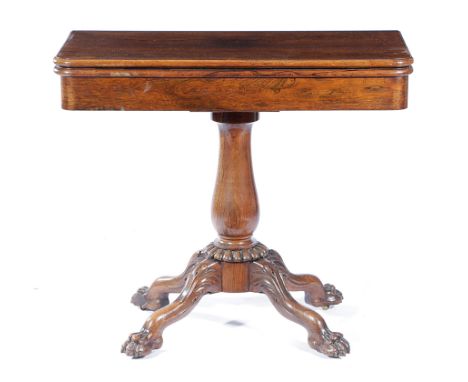 λ AN EARLY VICTORIAN ROSEWOOD CARD TABLE MID-19TH CENTURY with a baize lined playing surface, on four leaf carved legs and li