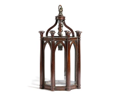 A SMALL MAHOGANY OCTAGONAL HALL LANTERN PROBABLY EARLY 20TH CENTURY decorated with turned columns and Gothic lancet arches, w