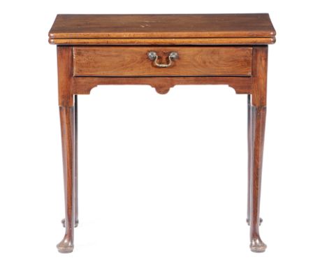 A GEORGE II MAHOGANY TEA TABLE C.1740 the fold-over top on a single gate support, fitted with a frieze drawer 72.5cm high, 70