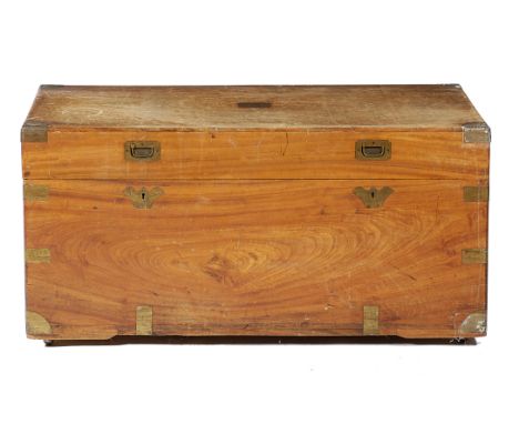 AN ANGLO-CHINESE CAMPHORWOOD TRUNK EARLY 20TH CENTURY with brass mounts, the interior with a lidded till and twin lots, one s