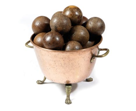 A DUTCH COPPER AND BRASS LOGBIN LATE 19TH CENTURY with a pair of handles and on tripod lion's paw feet, together with twenty-