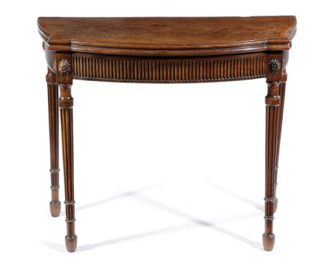 A GEORGE III MAHOGANY BOWFRONT CARD TABLE C.1790 the crossbanded fold-over top revealing a baize lined playing surface, above