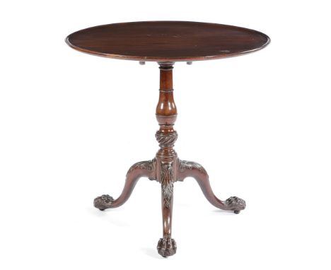 A GEORGE II MAHOGANY TRIPOD TABLE C.1740 AND LATER the circular dished tilt-top on a ring turned baluster stem and a fluted b