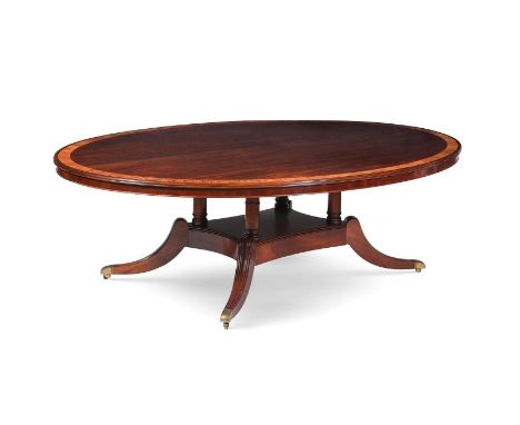 Y&nbspA MAHOGANY AND TULIPWOOD CROSSBANDED DINING TABLE IN REGENCY STYLE RECENTLY MANUFACTURED BY E. R. TRUPHET & SONS 72cm h