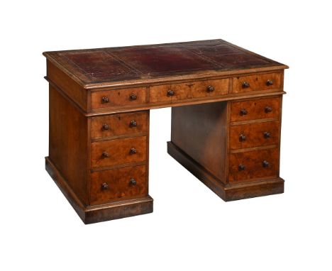 A VICTORIAN BURR WALNUT PEDESTAL DESK CIRCA 1840 The top inset with leather, veneered to all sides, some oak drawers with bra