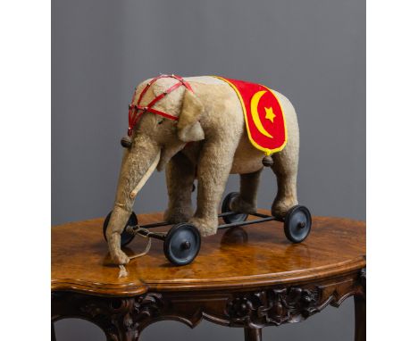 Elefant (Steiff), auf Rollen, m. Stimme, Gr. ca. B. 65 x H. 45 cm.