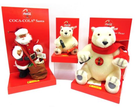 THREE STEIFF 'COCA-COLA' CHRISTMAS COLLECTOR'S SOFT TOYS comprising a Santa, limited edition 3114/10,000, boxed; seated adult