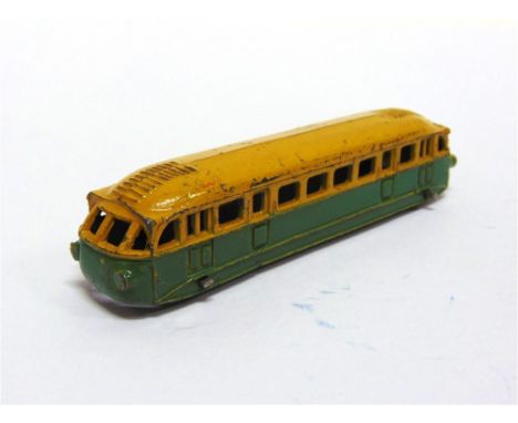 A PRE-WAR FRENCH DINKY NO.26, BUGATTI AUTORAIL lead body, yellow over green, green plastic roller wheels, good condition. 