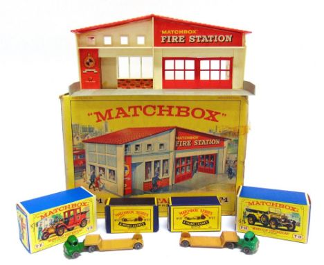 ASSORTED MATCHBOX TOYS comprising a plastic accessory building No.MF-1, Fire Station, red and white with a grey base, fair co