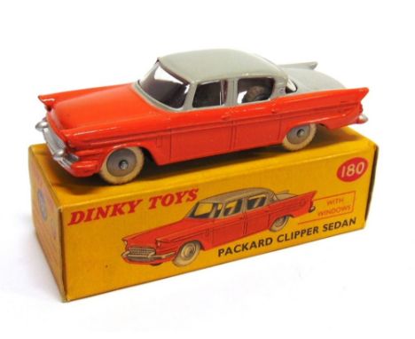 A DINKY NO.180, PACKARD CLIPPER two-tone grey and orange, grey ridged hubs, white M tyres, near mint (with enhanced rear ligh