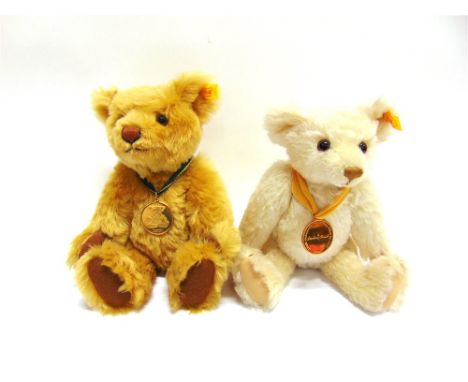 TWO STEIFF FOR DANBURY MINT COLLECTOR'S YEAR BEARS, MILLENNIUM & 2001 each with neck medal, approximately 29cm high.