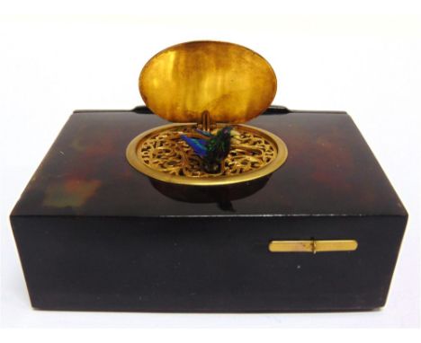 A 19TH CENTURY FRENCH TORTOISESHELL BIRD AUTOMATON MUSIC BOX of rectangular form, with a clockwork mechanism operated by a sl