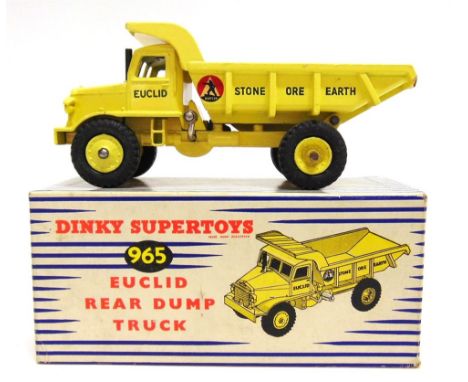 A DINKY NO.965, EUCLID REAR DUMP TRUCK pale yellow, 'Stone Ore Earth' decal, pale yellow hubs, black tyres, near mint (with h