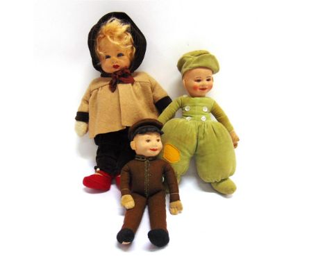 THREE CHAD VALLEY CLOTH DOLLS including a Dutch style boy, 26cm high; and a bell-boy, 26cm high, each labelled to left foot. 