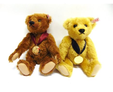 TWO STEIFF FOR DANBURY MINT COLLECTOR'S YEAR BEARS, 2010 & 2011 each with neck medal, approximately 29cm high.